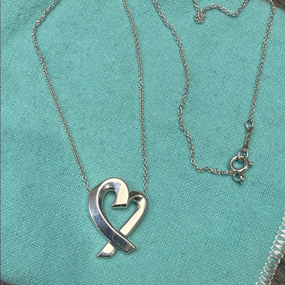 TIFFANY & CO. Silver Heart Ribbon Pendant Necklace - Women Jewelry